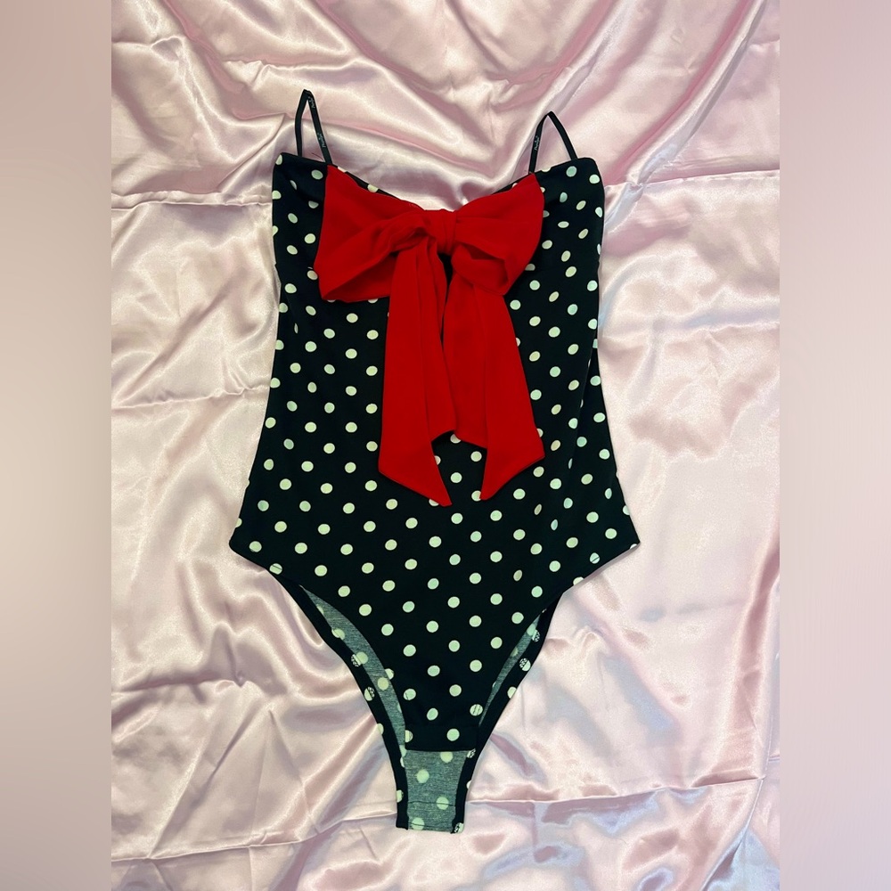 Strapless polkadot bodysuit with red bow